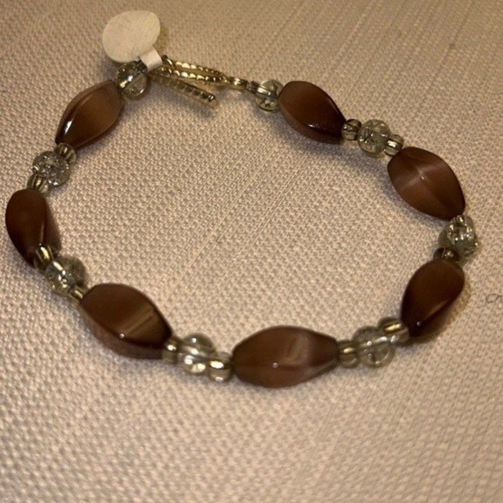 Handcrafted silver tone purple and clear bead bracelet
